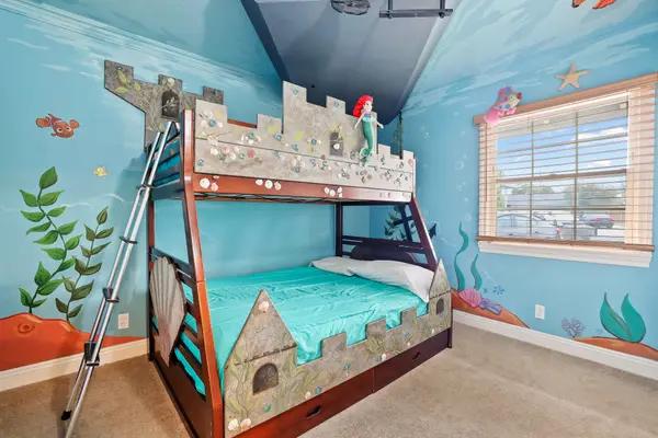 Little Mermaid-inspired bedroom with themed bunk beds